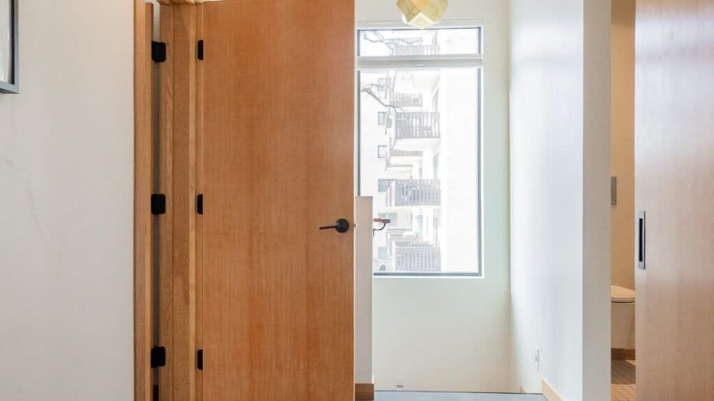 empty apartment doorway on move-out day, the first step to get your security deposit back