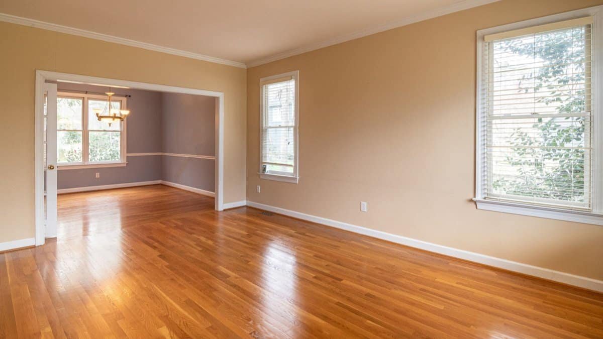 empty apartment room with hardwood floor cleaned before handing back keys
