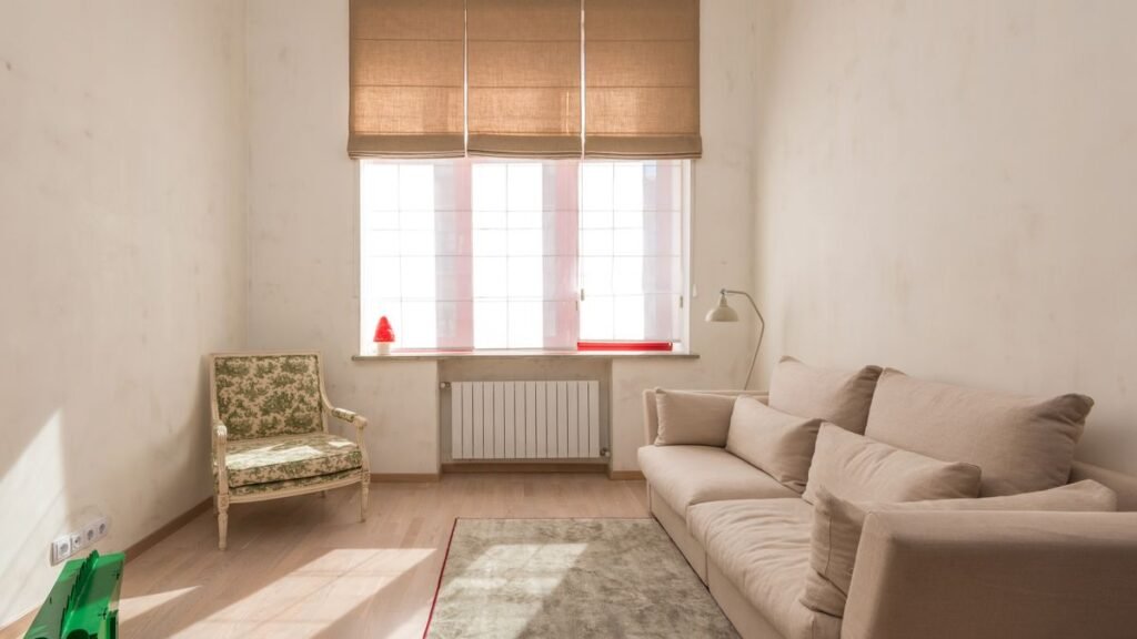 setting up utilities in a sunlit first apartment living room